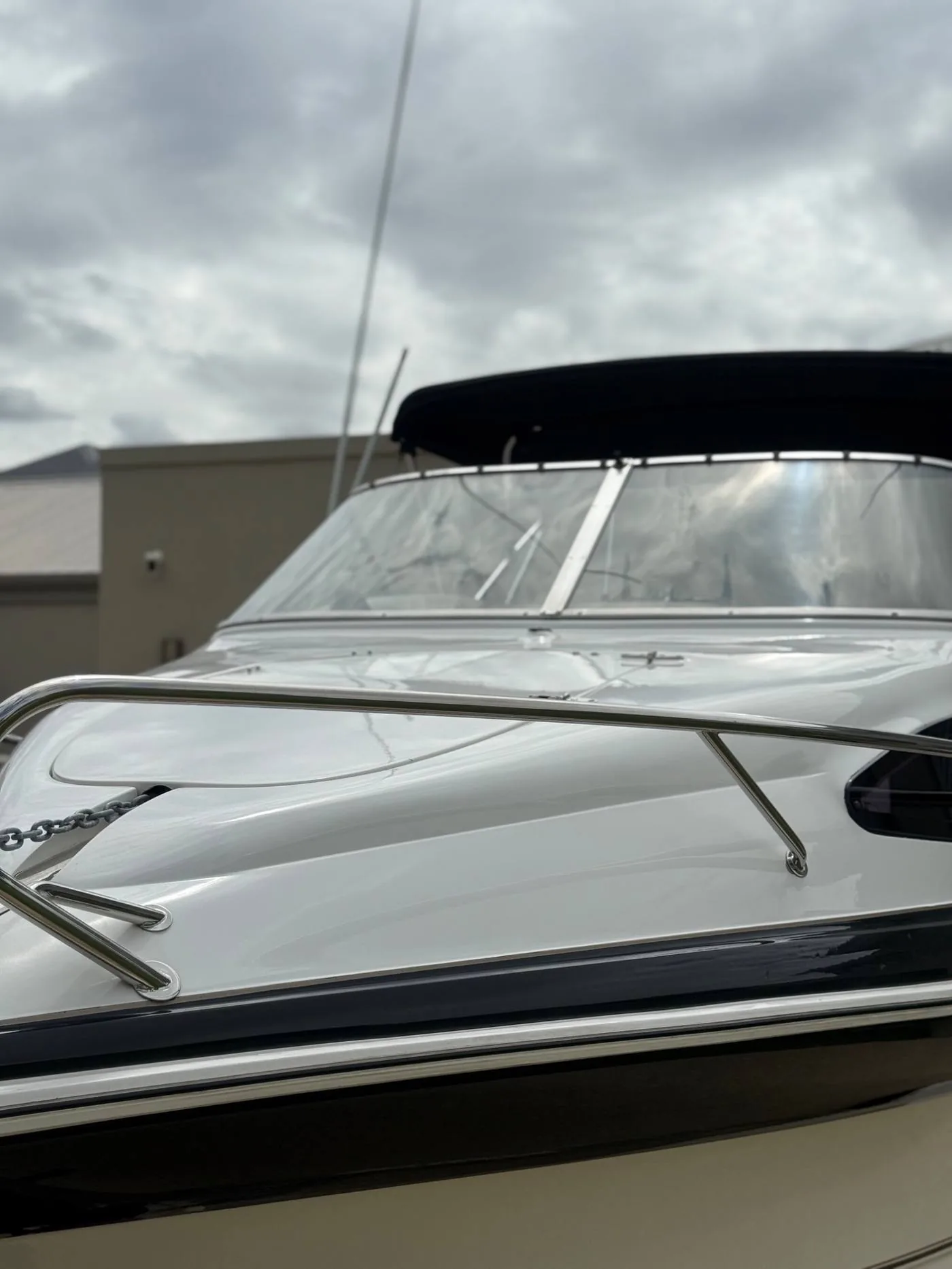 Polished boat hull closeup Perth — mirror gloss gelcoat finish by Perth Boat Detailing Co